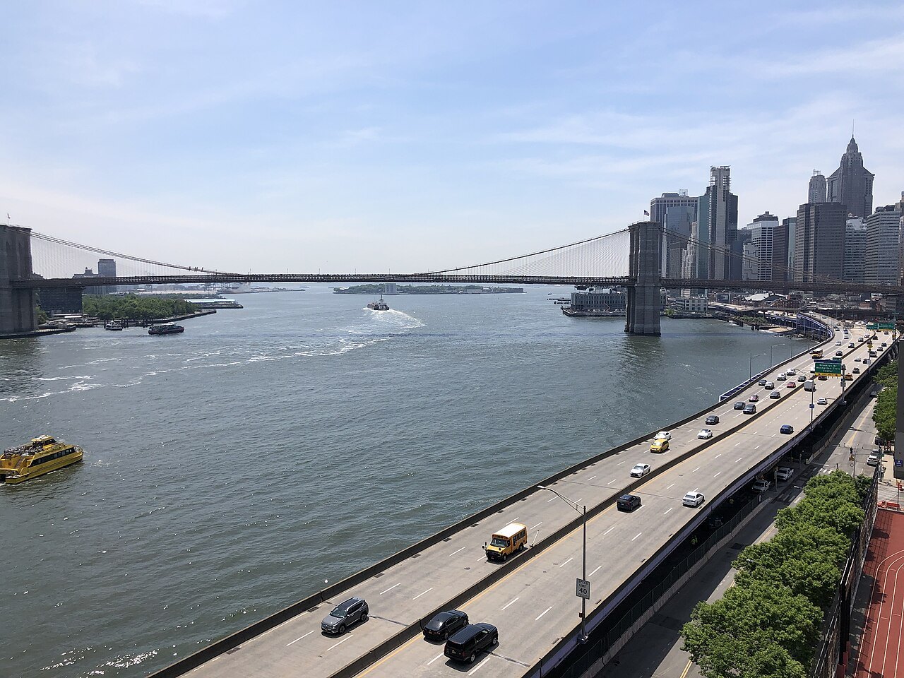 The East River and the Brooklyn Bridge from above the FDR Drive, looking south