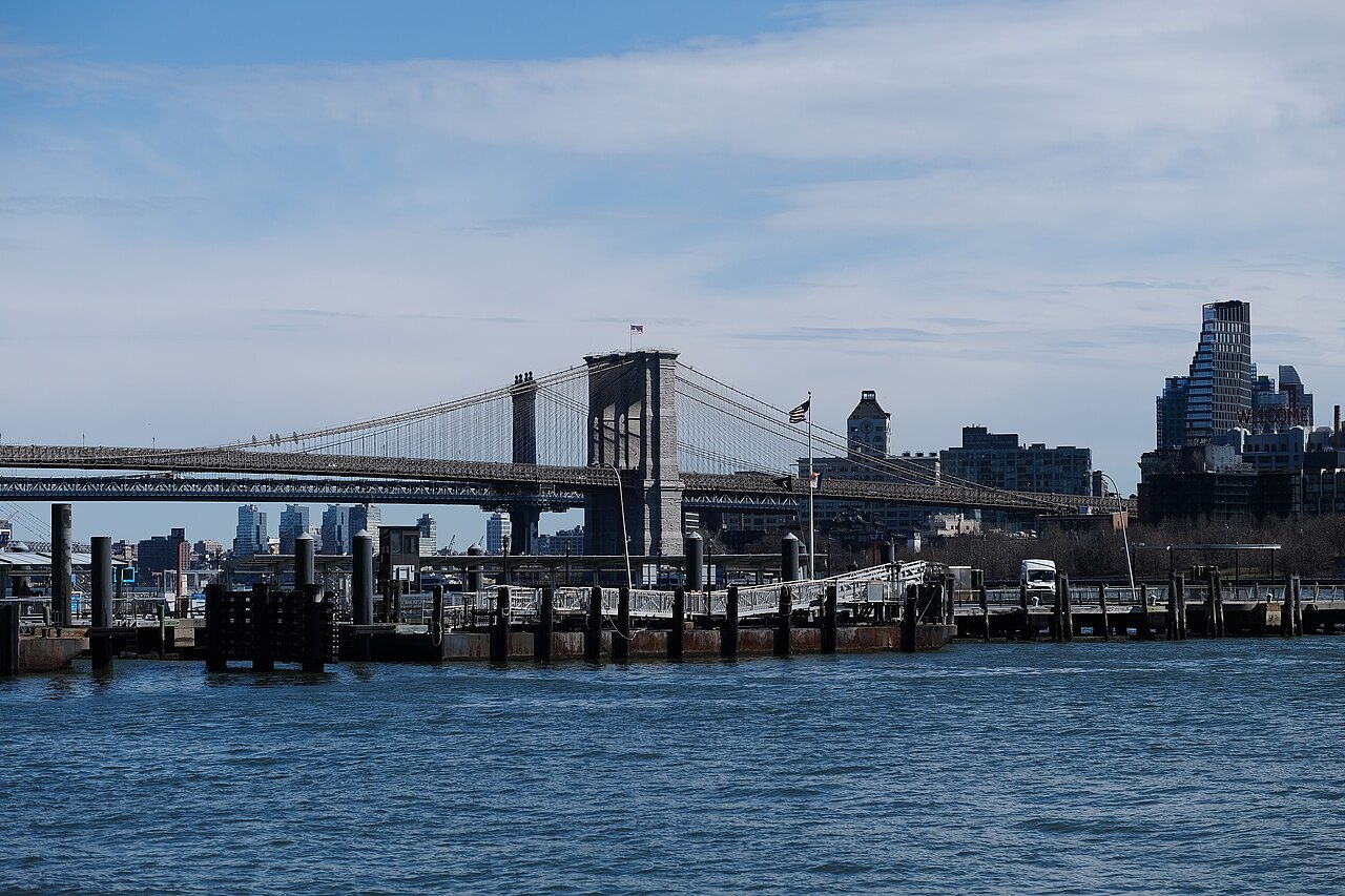 The Brooklyn Bridge from the East River piers, Brooklyn's towers beyond