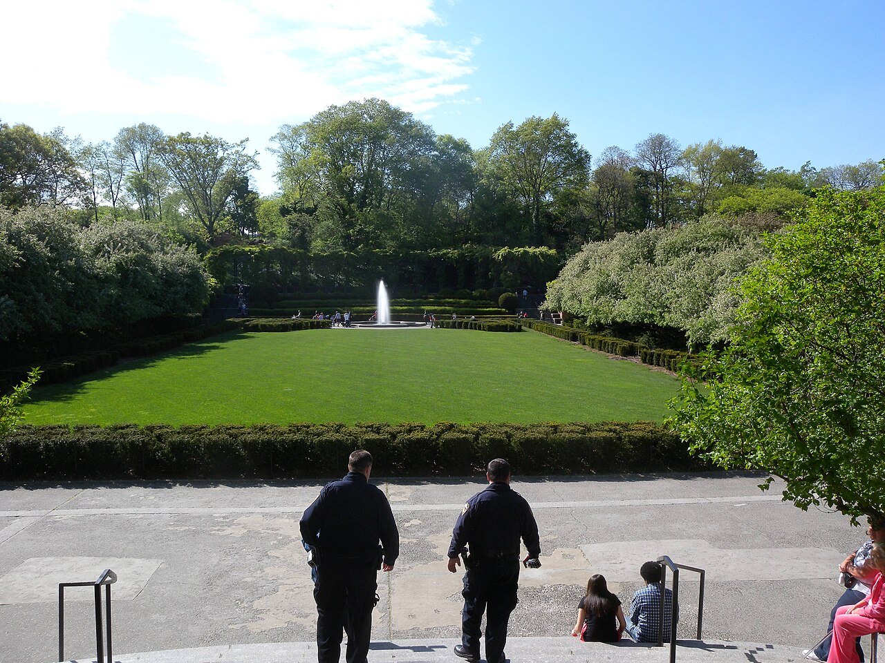 The central lawn and fountain of the Conservatory Garden in summer