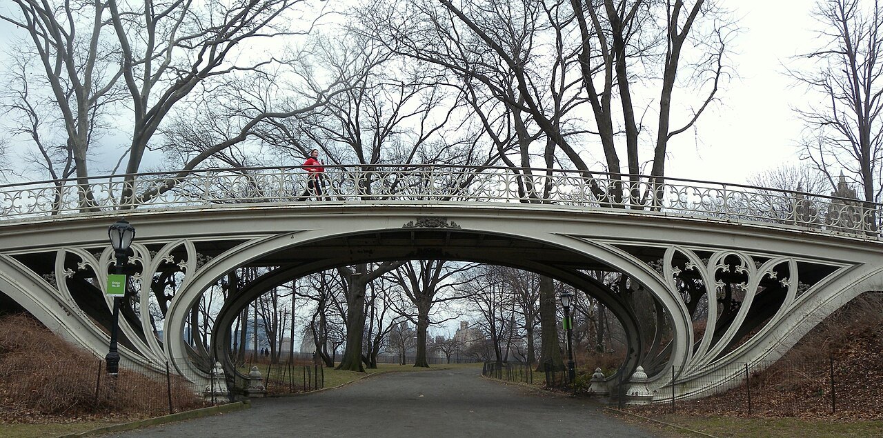 The cast-iron Gothic Bridge over a bridle path on a gray winter day
