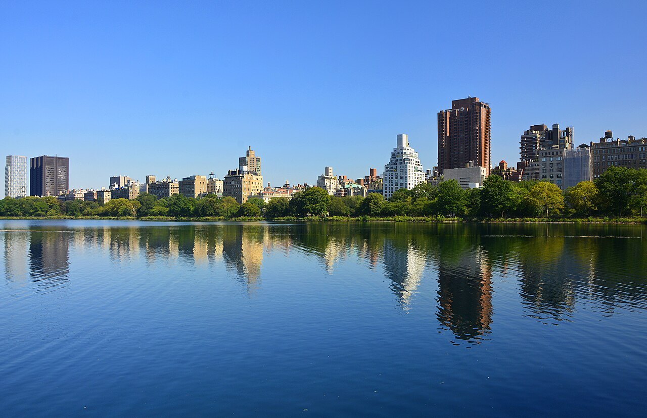 The Reservoir on a clear day, with the apartment houses of Fifth Avenue beyond