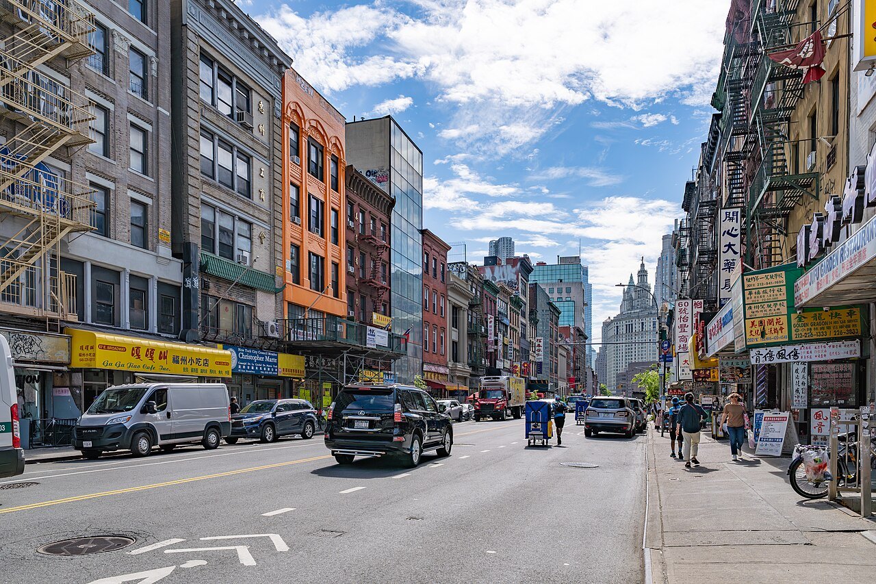 East Broadway in Little Fuzhou, with the Municipal Building in the distance