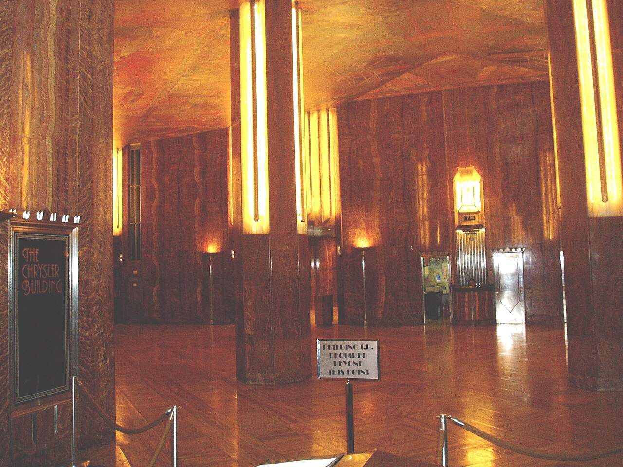 The Chrysler Building's lobby of dark marble and amber light