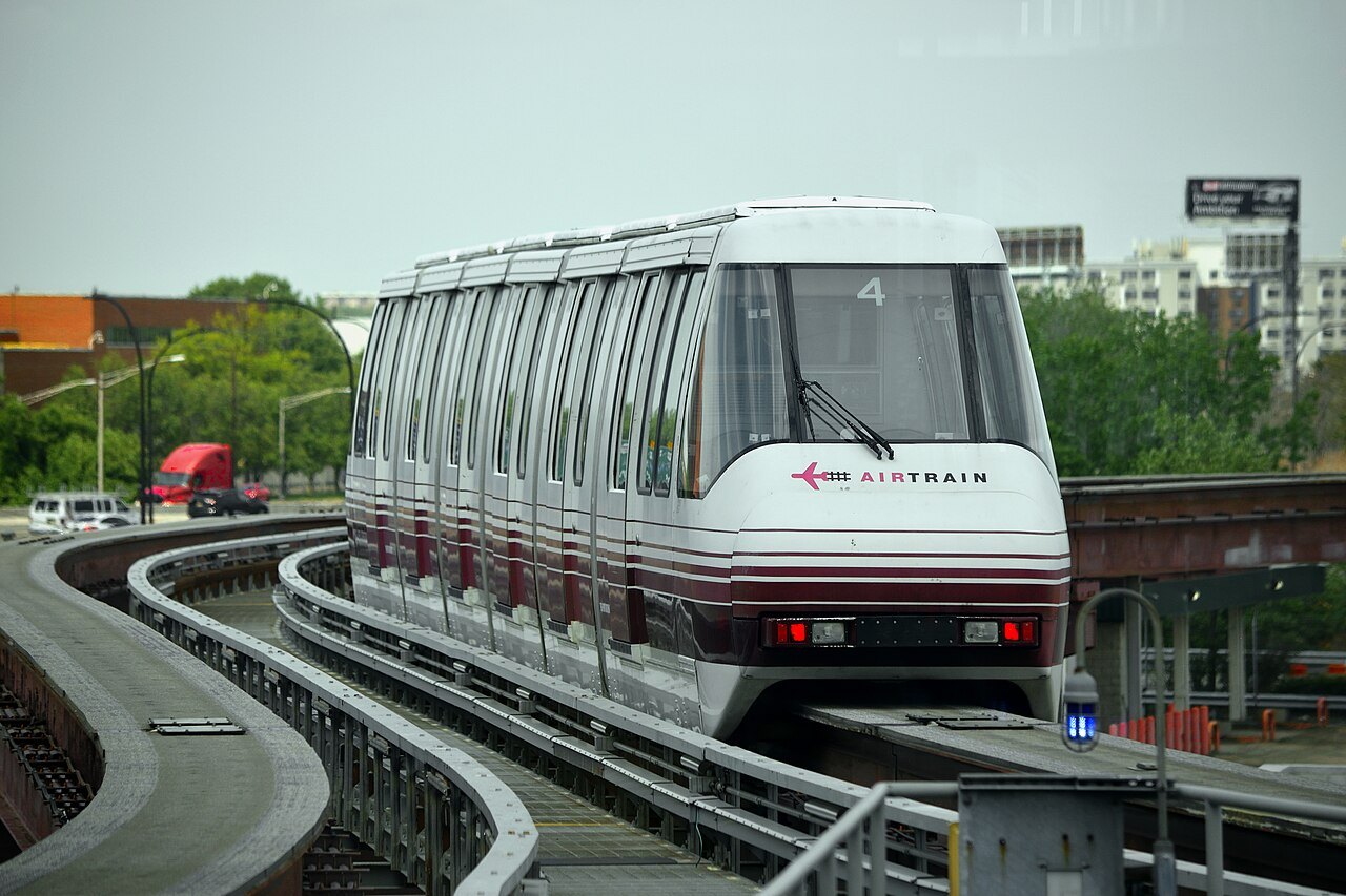 An AirTrain monorail curving away from Newark's Terminal A