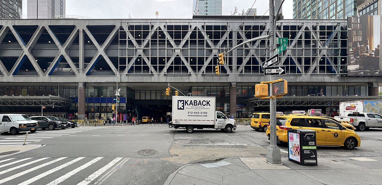 The Port Authority Bus Terminal on Eighth Avenue, its steel frame over the street