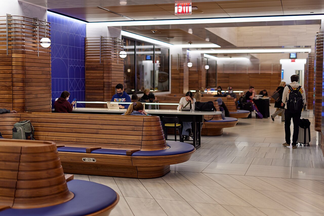 Wooden benches in the Moynihan Train Hall waiting room