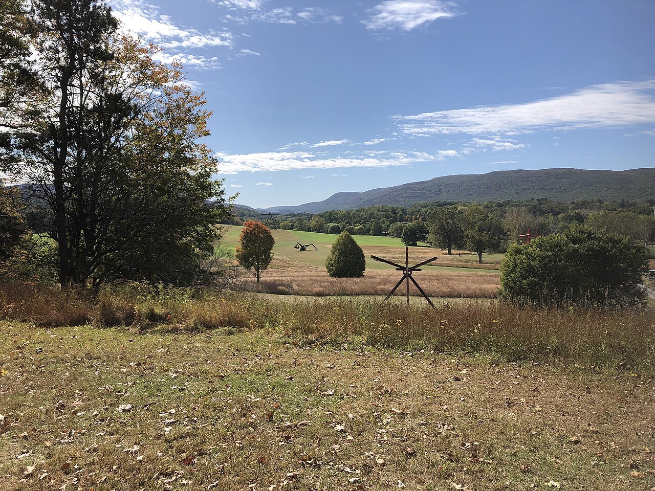 Open fields and hills in the sculpture park at Storm King