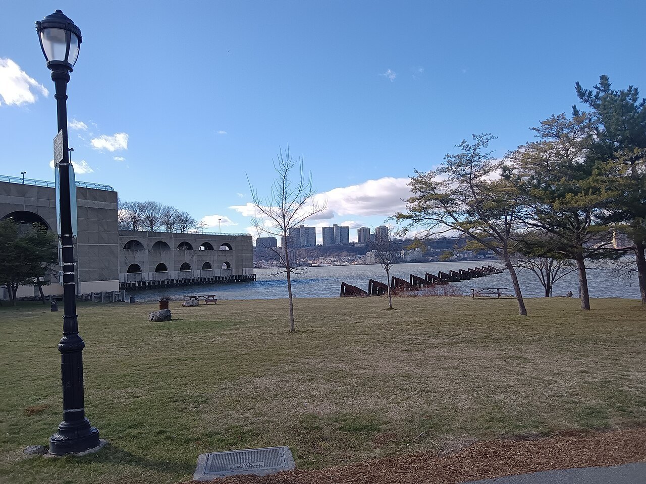Riverside Park's lawn above the Hudson on a clear autumn day