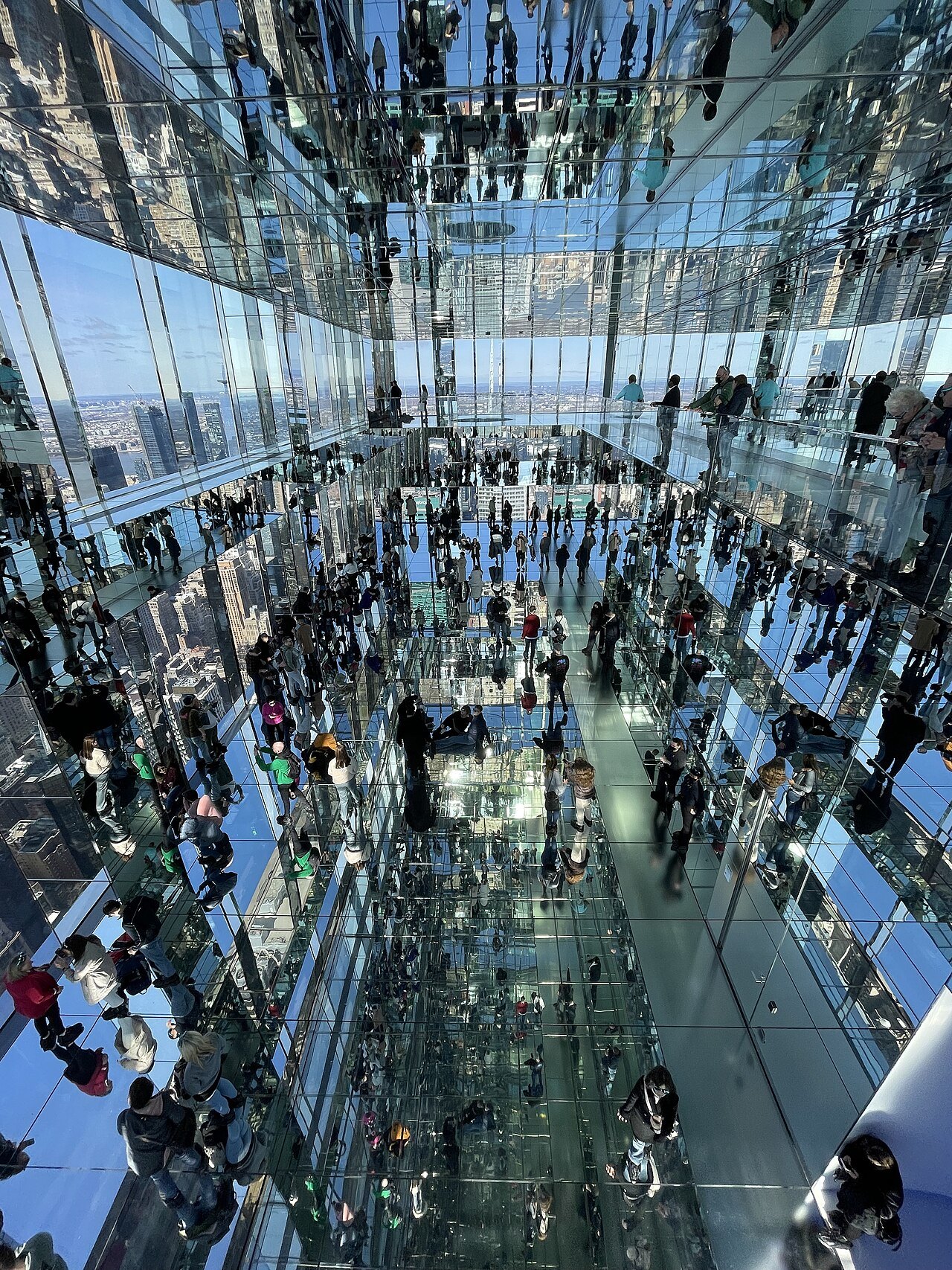 Looking down through mirrored floors at Summit One Vanderbilt