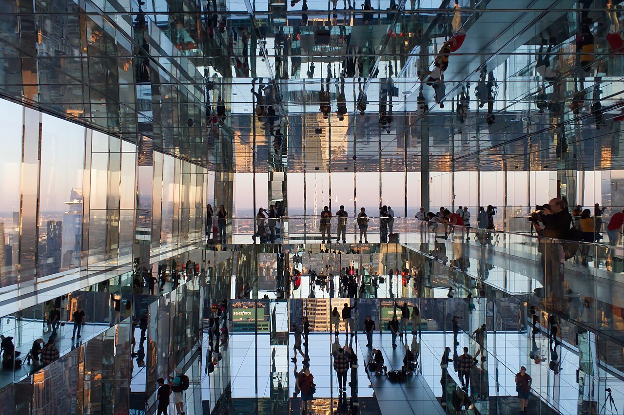 Visitors in the mirrored room at Summit One Vanderbilt