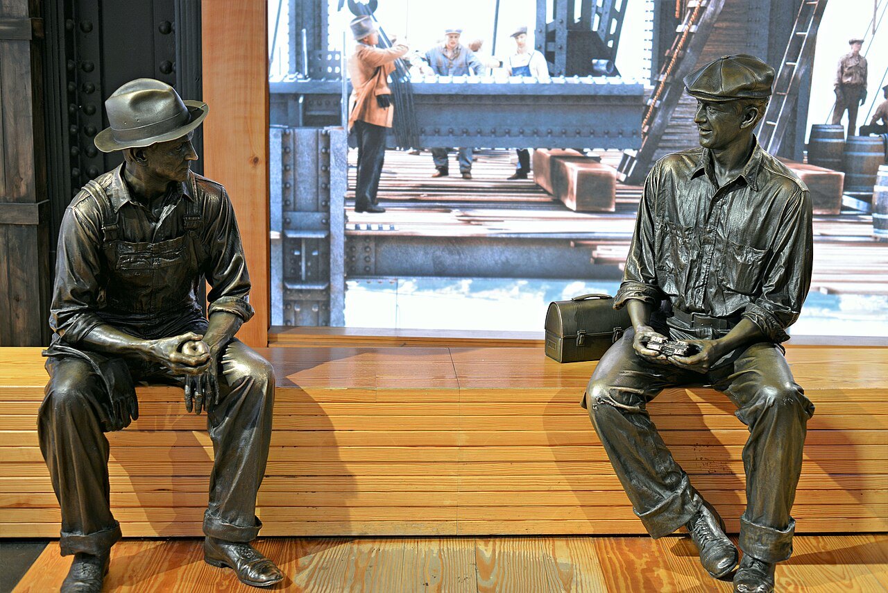 Bronze figures of construction workers inside the Empire State Building's lobby exhibit