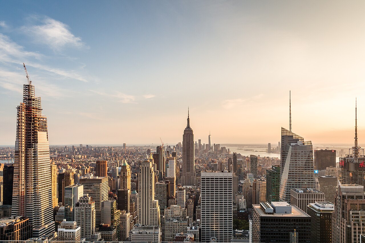 The Empire State Building standing over Midtown in the evening haze