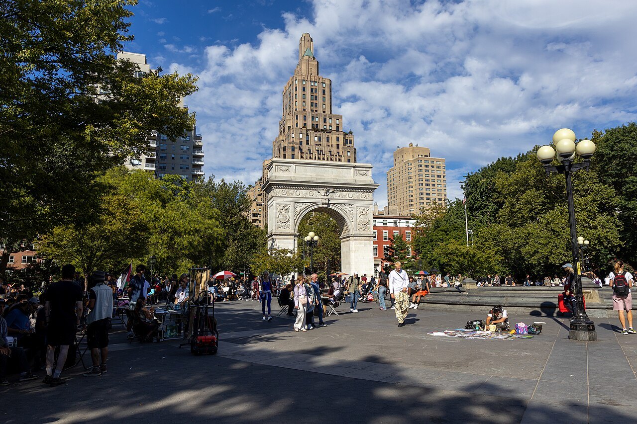 The Washington Square Arch at the foot of Fifth Avenue on a September day