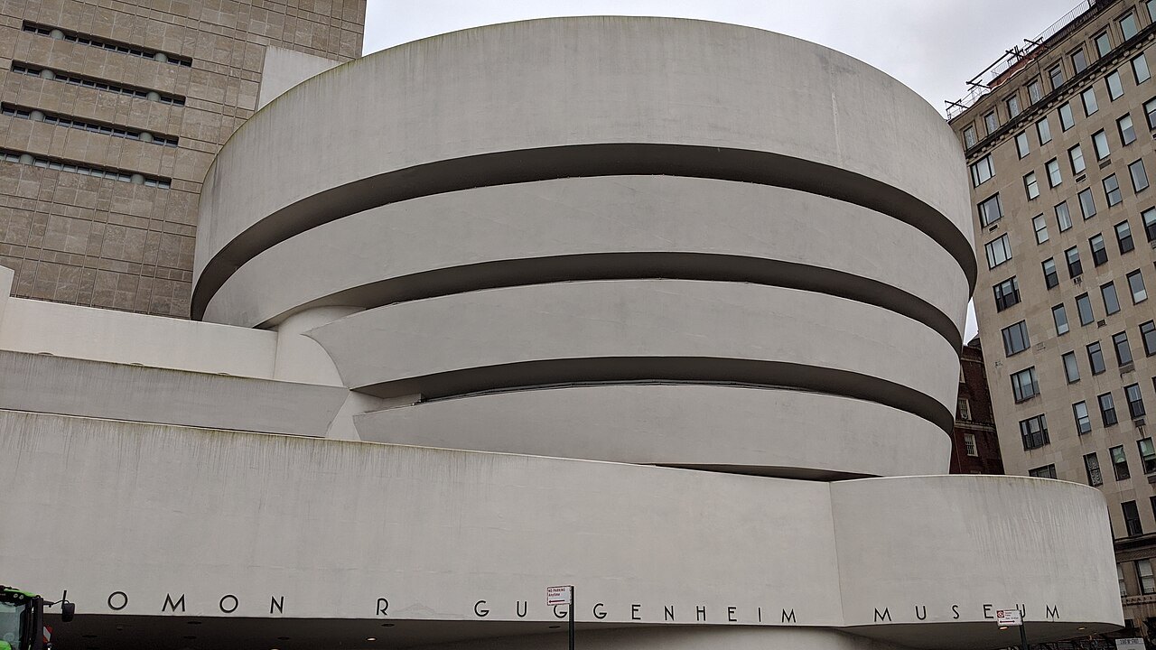 The curved bands of the Guggenheim's facade, its name along the base