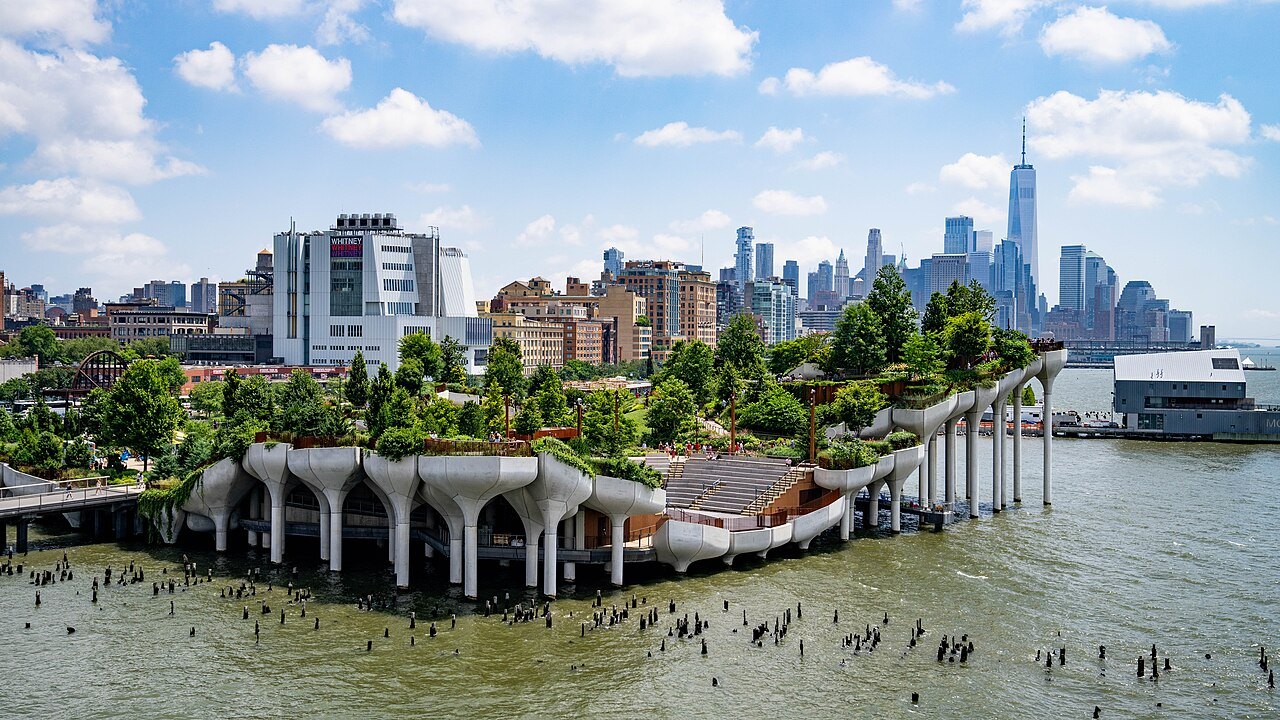 Little Island on its concrete tulips in the Hudson, with Lower Manhattan beyond
