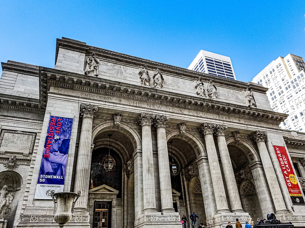 The library's marble facade and arched entrances from below