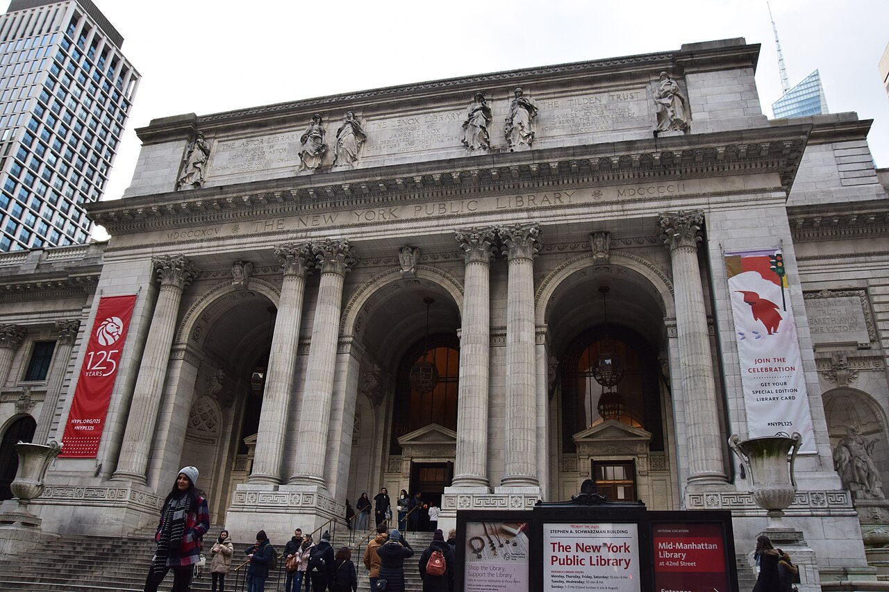 The library's central portico with banners and people on the steps