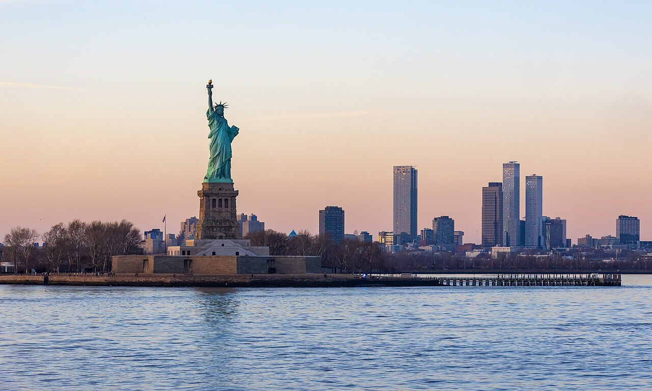 How do you visit the Statue of Liberty and Ellis Island?