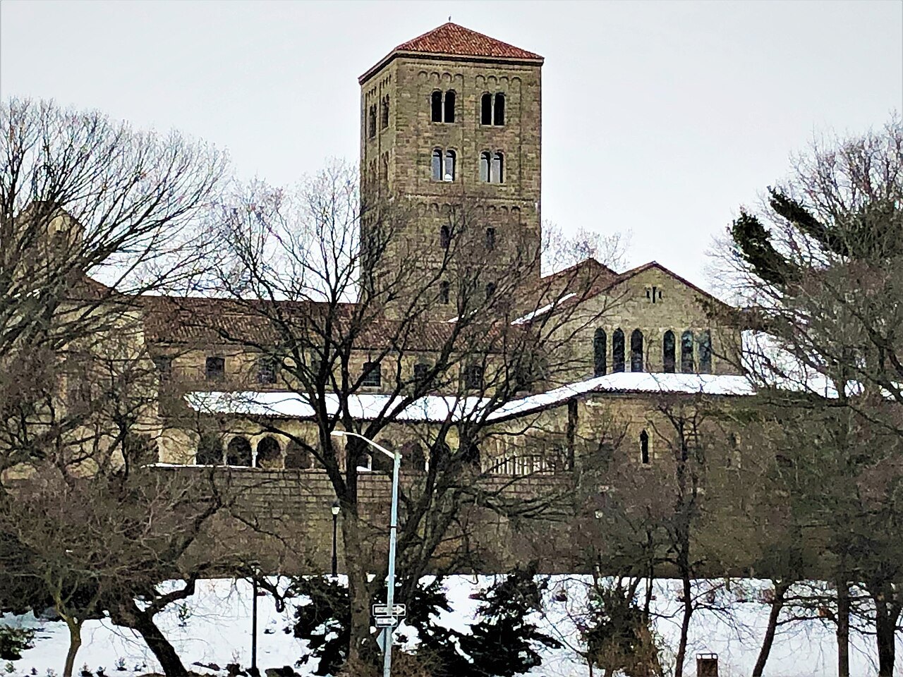 The Cloisters' square tower above the snow in winter