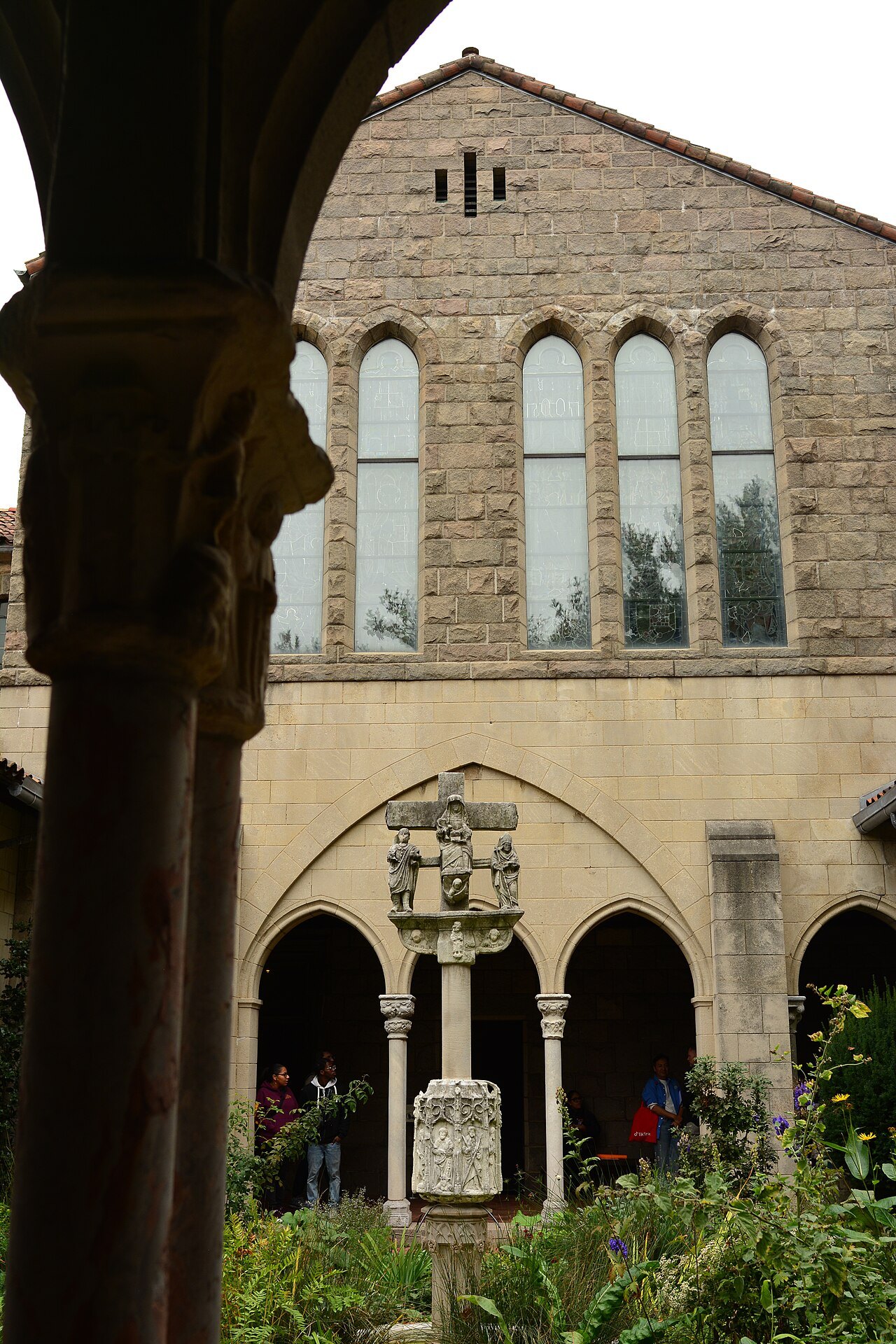 A cloister arcade and stone chapel at the Cloisters