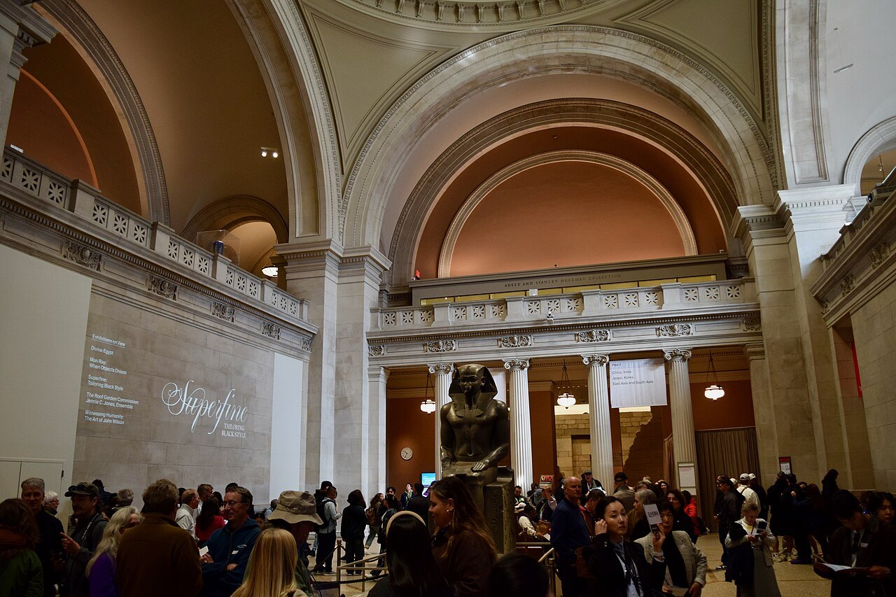 Crowds in the Great Hall of the Met under its domes