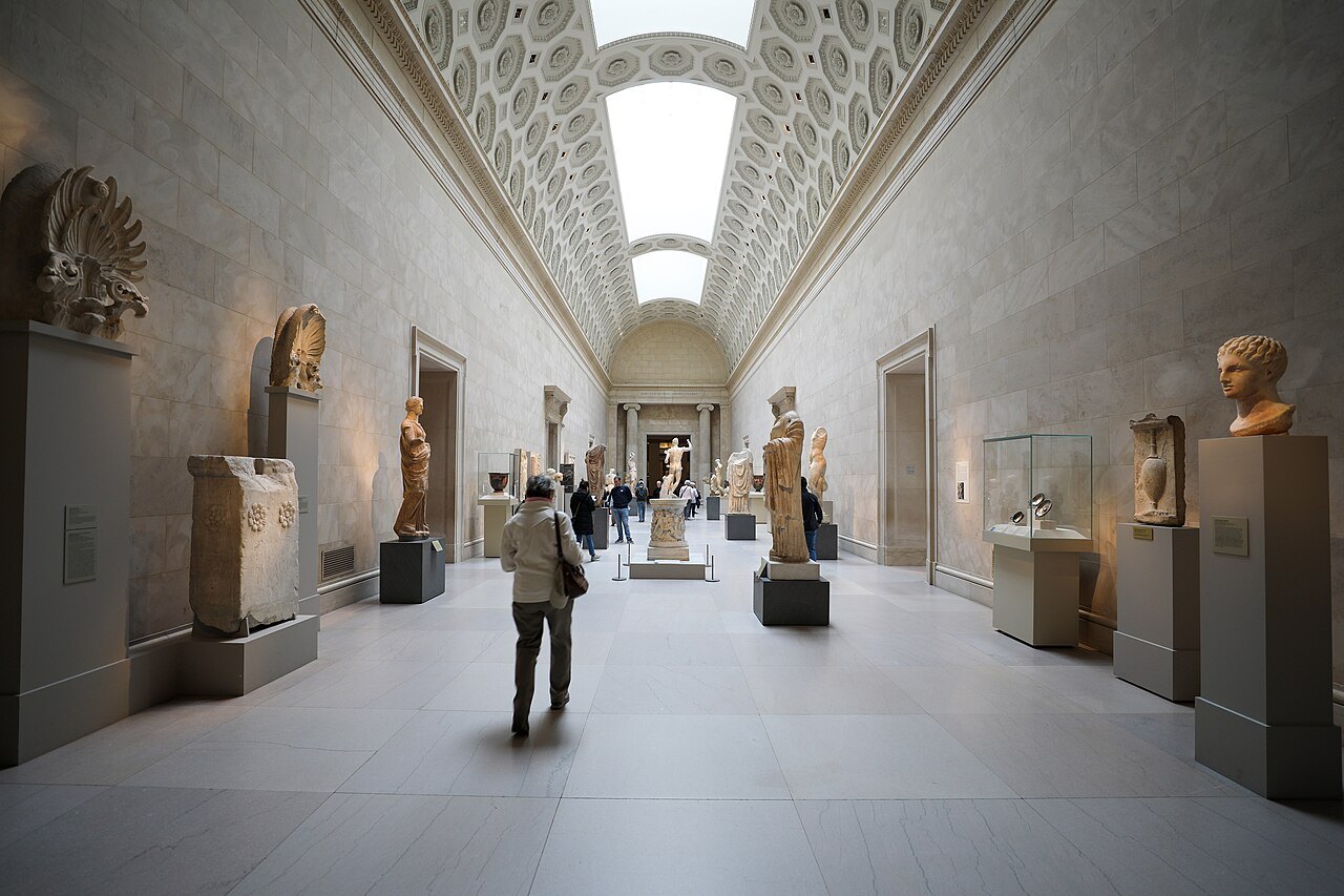 Greek and Roman sculpture along a vaulted gallery at the Met
