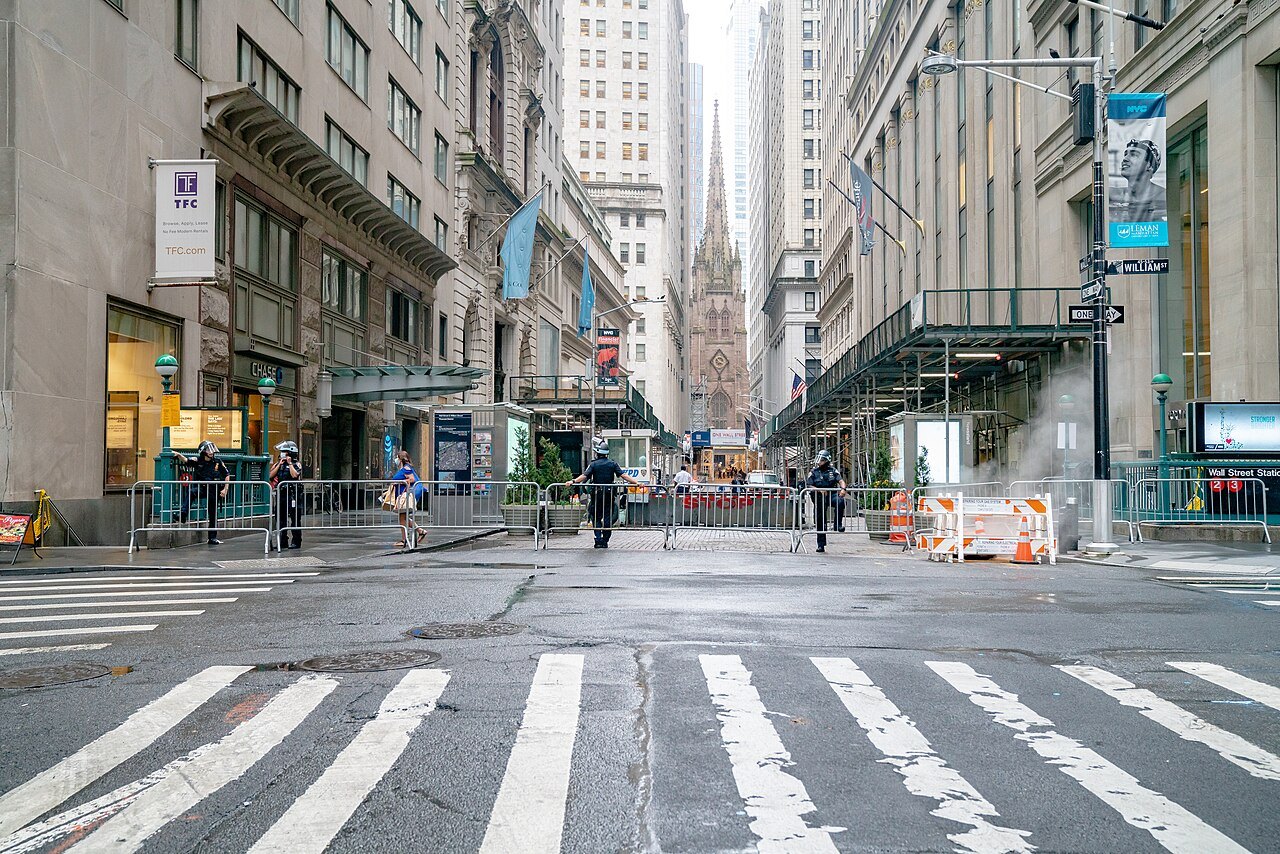 Wall Street closed to cars, Trinity Church at the far end
